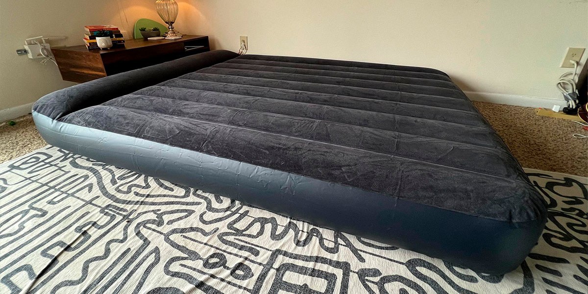 Intex Dura-Beam Standard Pillow Rest Classic Air Mattress Series on floor