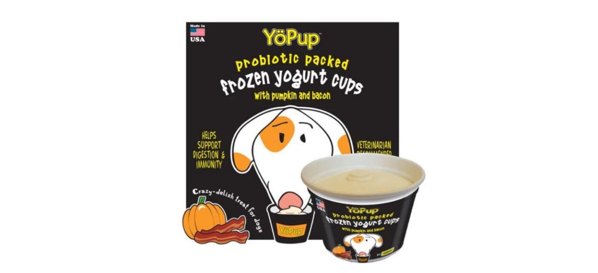 a black label and cup with a picture of a dog eating out of the cup